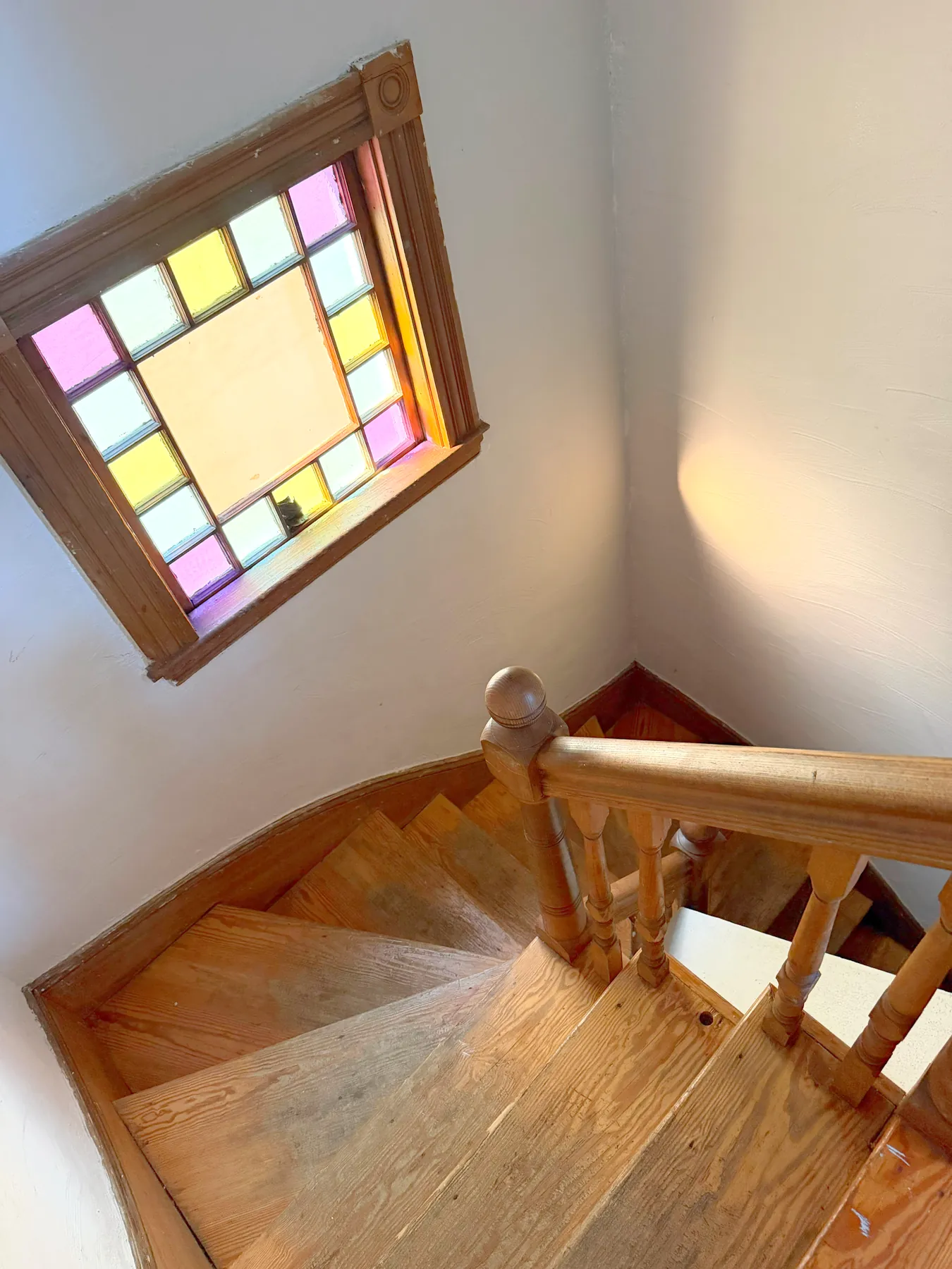 Stained glass window above the staircase